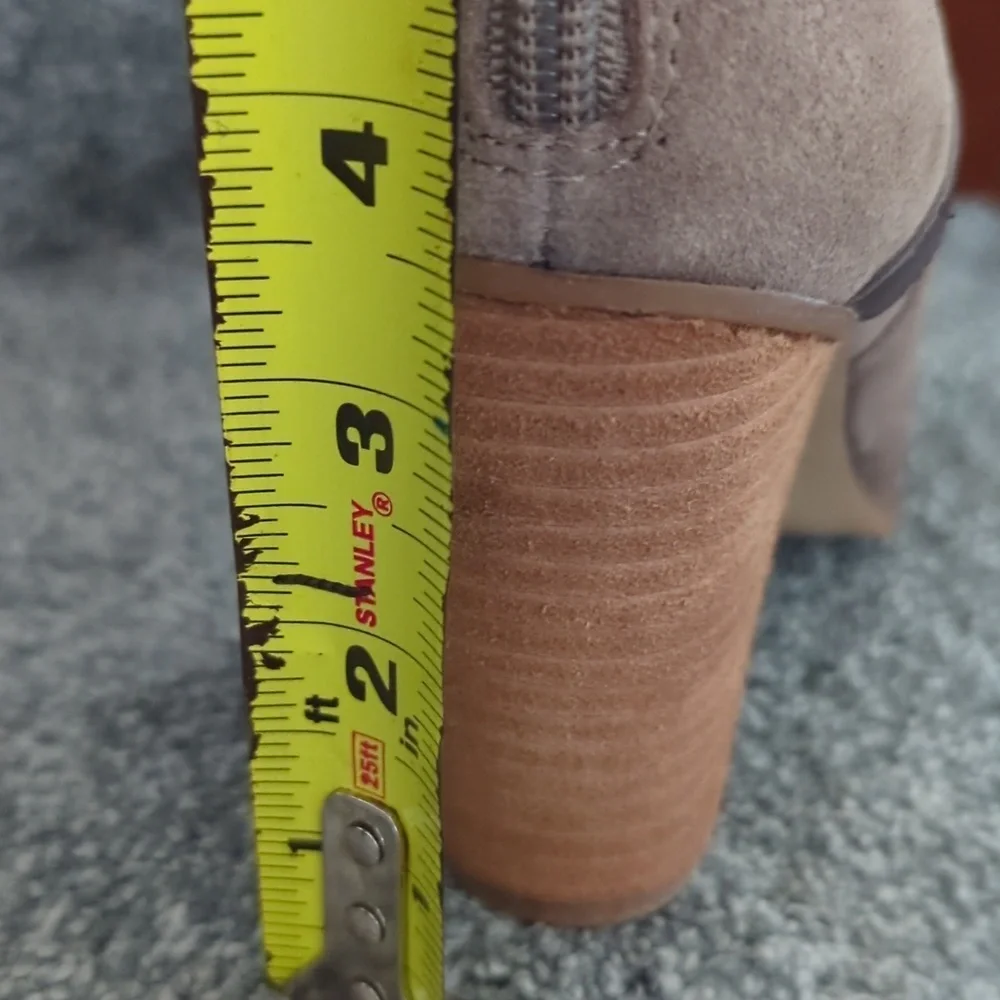 Ankle booties by Carlos Santana
